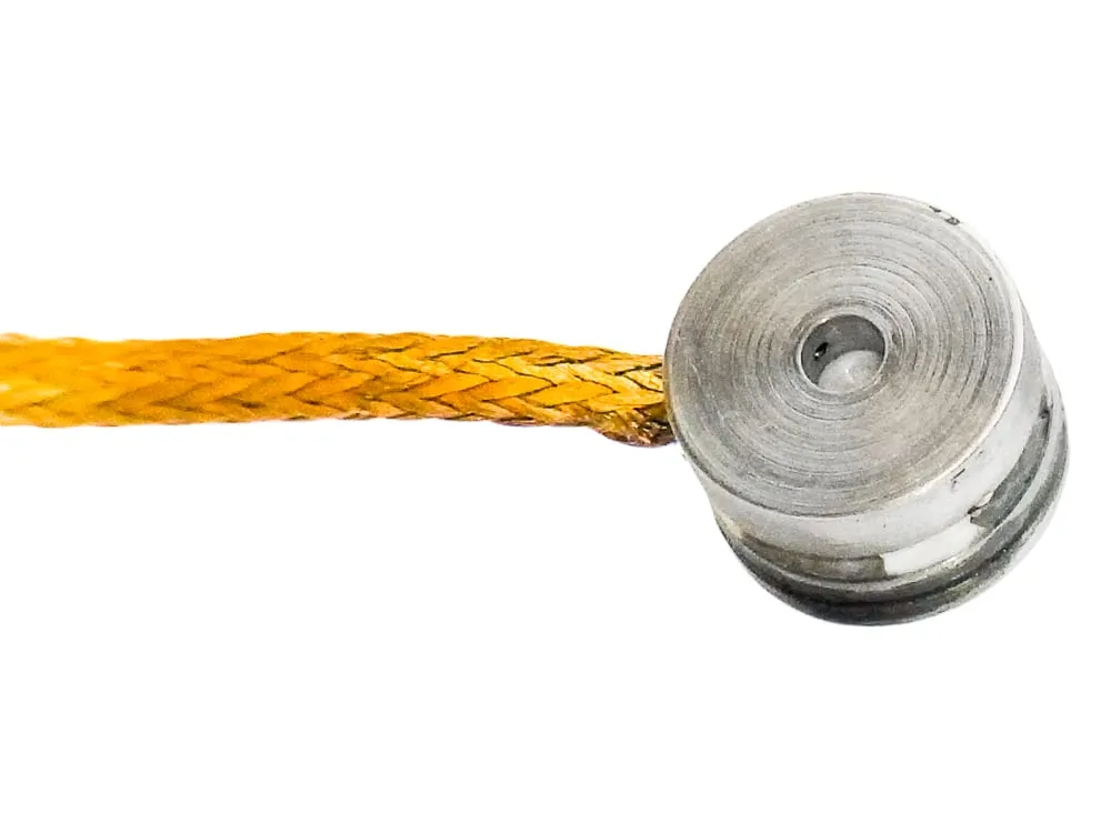 The MHS micro heating stage — a small cylindrical stage with a braided copper thermal strap, on a white background.