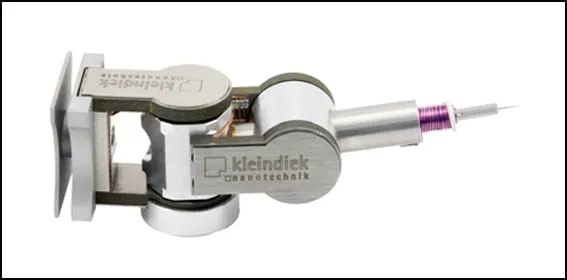 An array of MM3A-EM manipulators with magenta drive coils converging towards a central point.